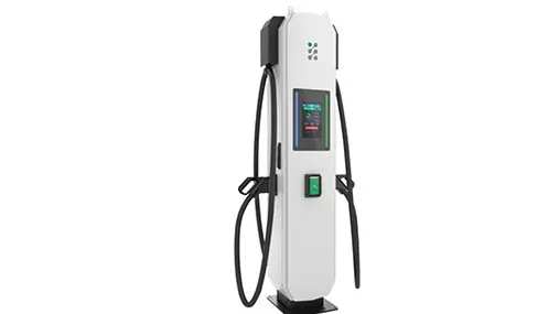 A tall white electric vehicle charging station with a digital display and two black charging cables, standing against a plain white background.