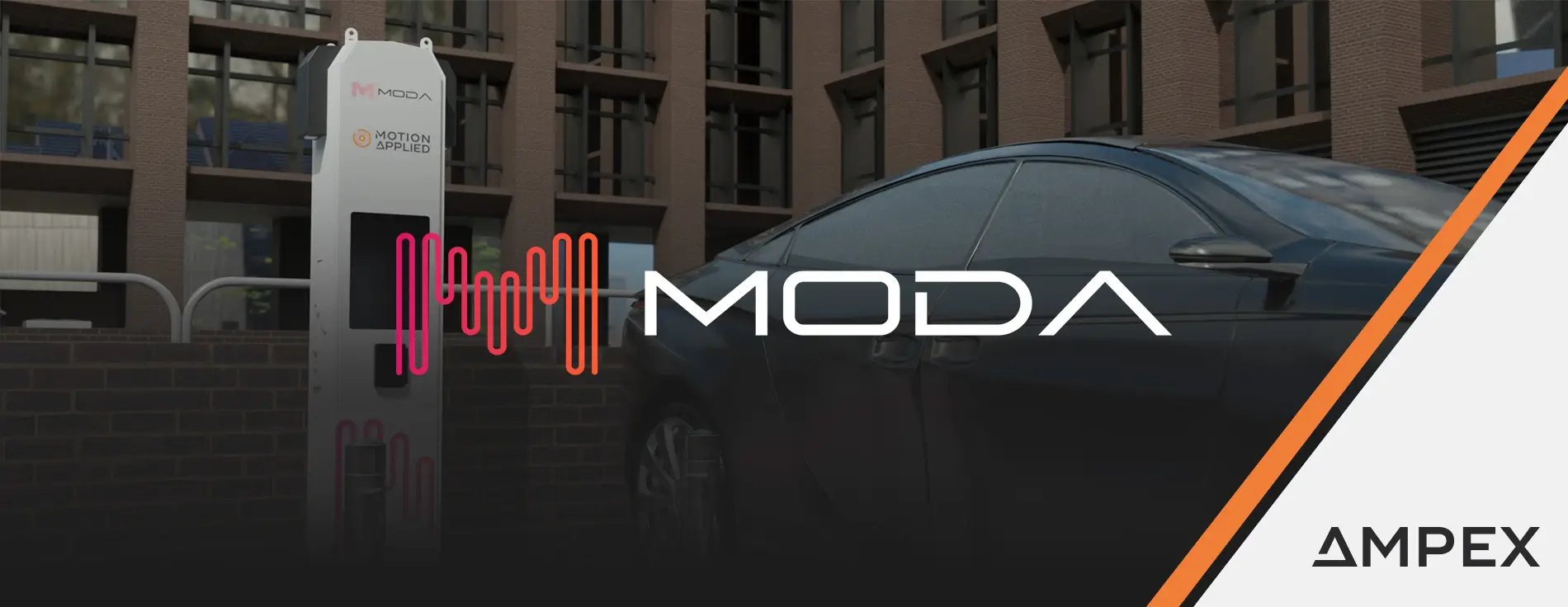 A sleek black electric car parked next to a white ultra-rapid EV charging station branded with “MODA” and “Motion Applied.” The charger has a digital display and pink cable graphics at the bottom. The setting is an urban area with a brick wall and modern office building in the background.