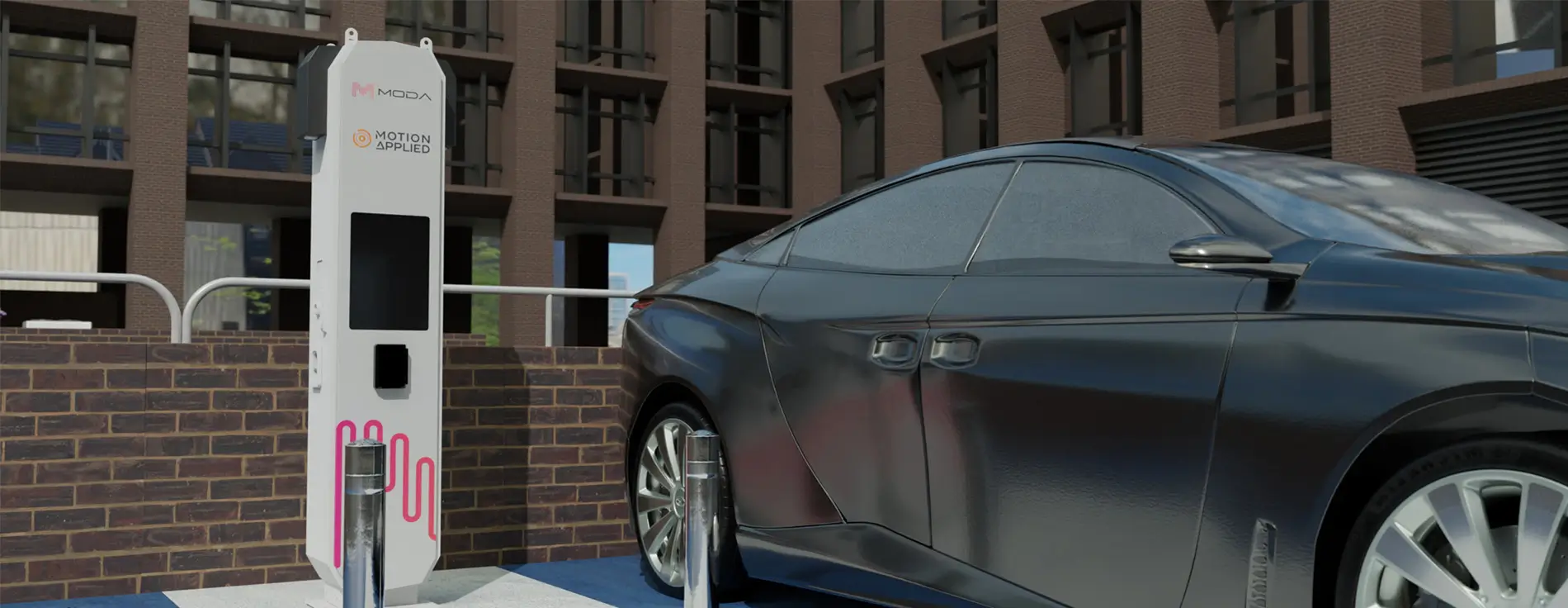 A sleek black electric car parked next to a white ultra-rapid EV charging station branded with “MODA” and “Motion Applied.” The charger has a digital display and pink cable graphics at the bottom. The setting is an urban area with a brick wall and modern office building in the background.