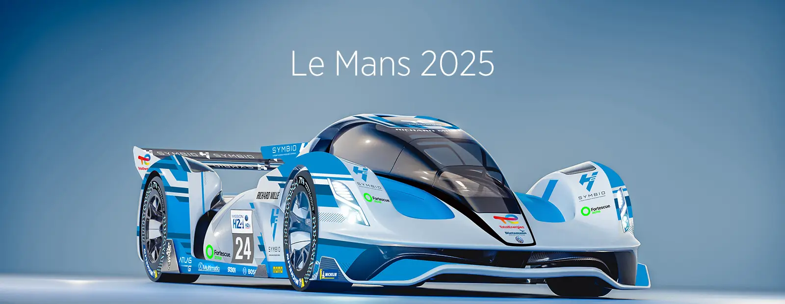 A futuristic blue and white H24 race car with aerodynamic design and sponsor logos displayed on its body, positioned on a glossy surface under bright lighting. The text “Le Mans 2025” appears above the car against a gradient blue background.