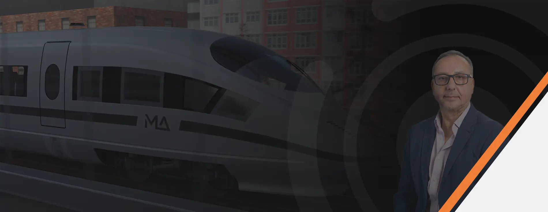 Man stood in front of train with the words "Moin Majid leads Motion Applied's APAC expansion"