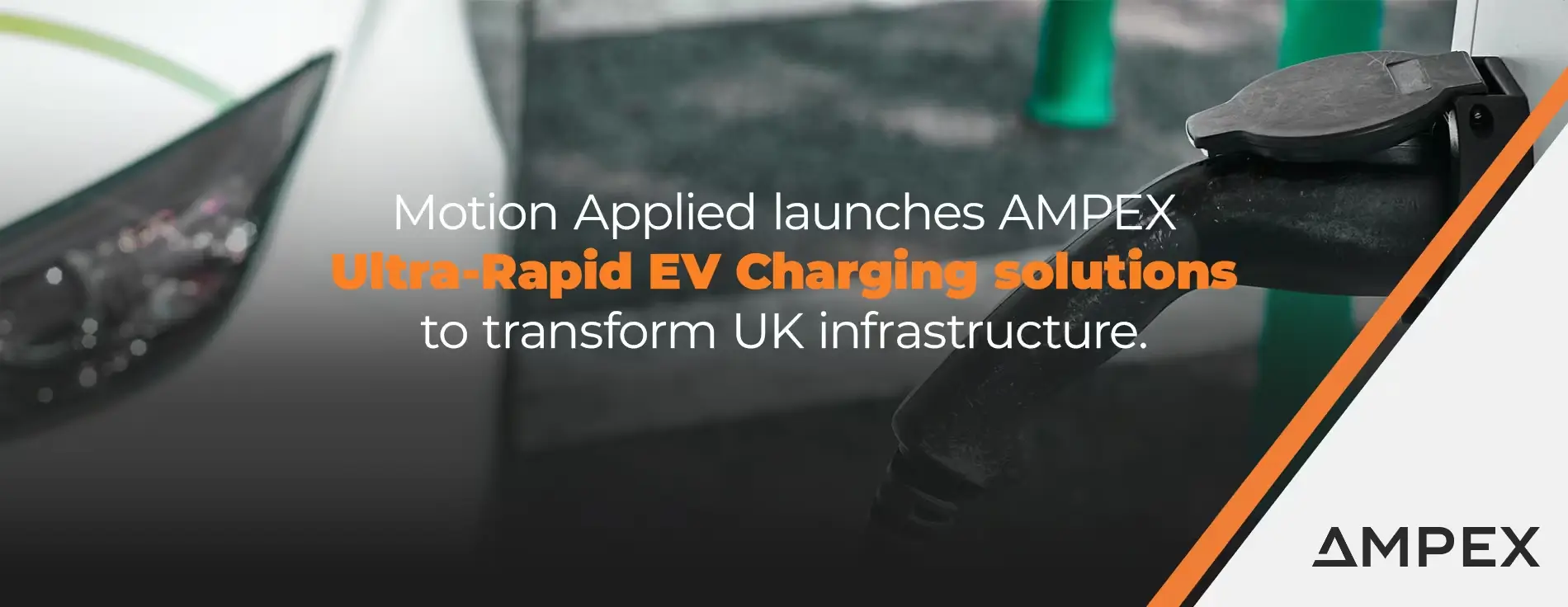 Close‑up of an electric vehicle charging connector plugged into a white car, with overlaid text reading ‘Motion Applied launches AMPEX Ultra‑Rapid EV Charging solutions to transform UK infrastructure,’ and AMPEX branding visible.